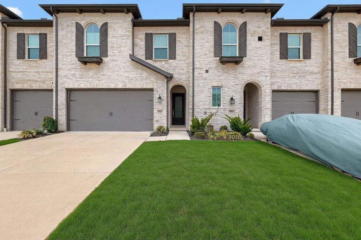 Front of 1162 Queensdown Way, a two-story townhome in Forney, Texas