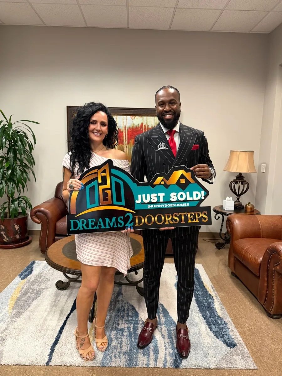 New homeowners celebrating together in their living room